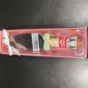 Ceramic, whimsical, stainless steel cake server